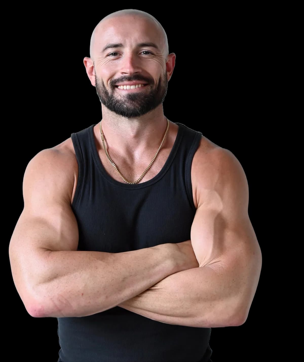 Christian Beck, arms crossed, smiling, in a black tank top